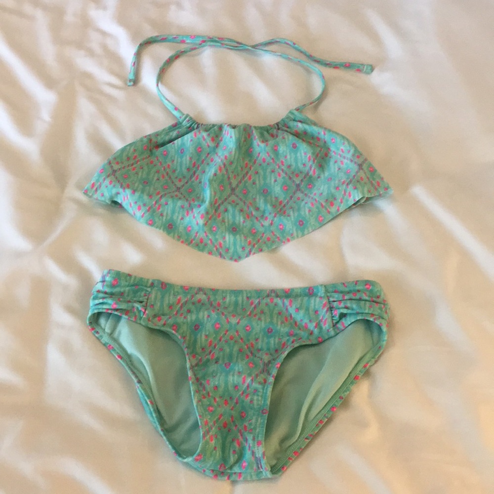 Girls teal and pink patterned bikini.